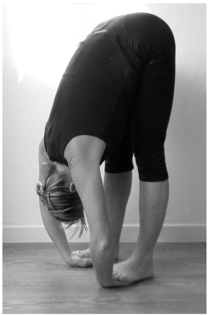 Step 3 Padahastasana forward fold