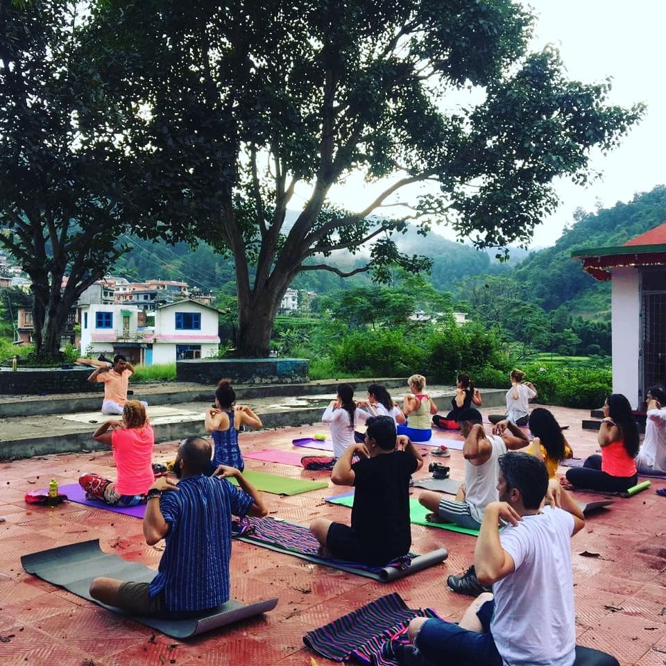 Yoga teacher demonstrating class planning